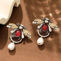 Retro bee drop earrings in alloy with regular chain, shown in gold or antique white K for women