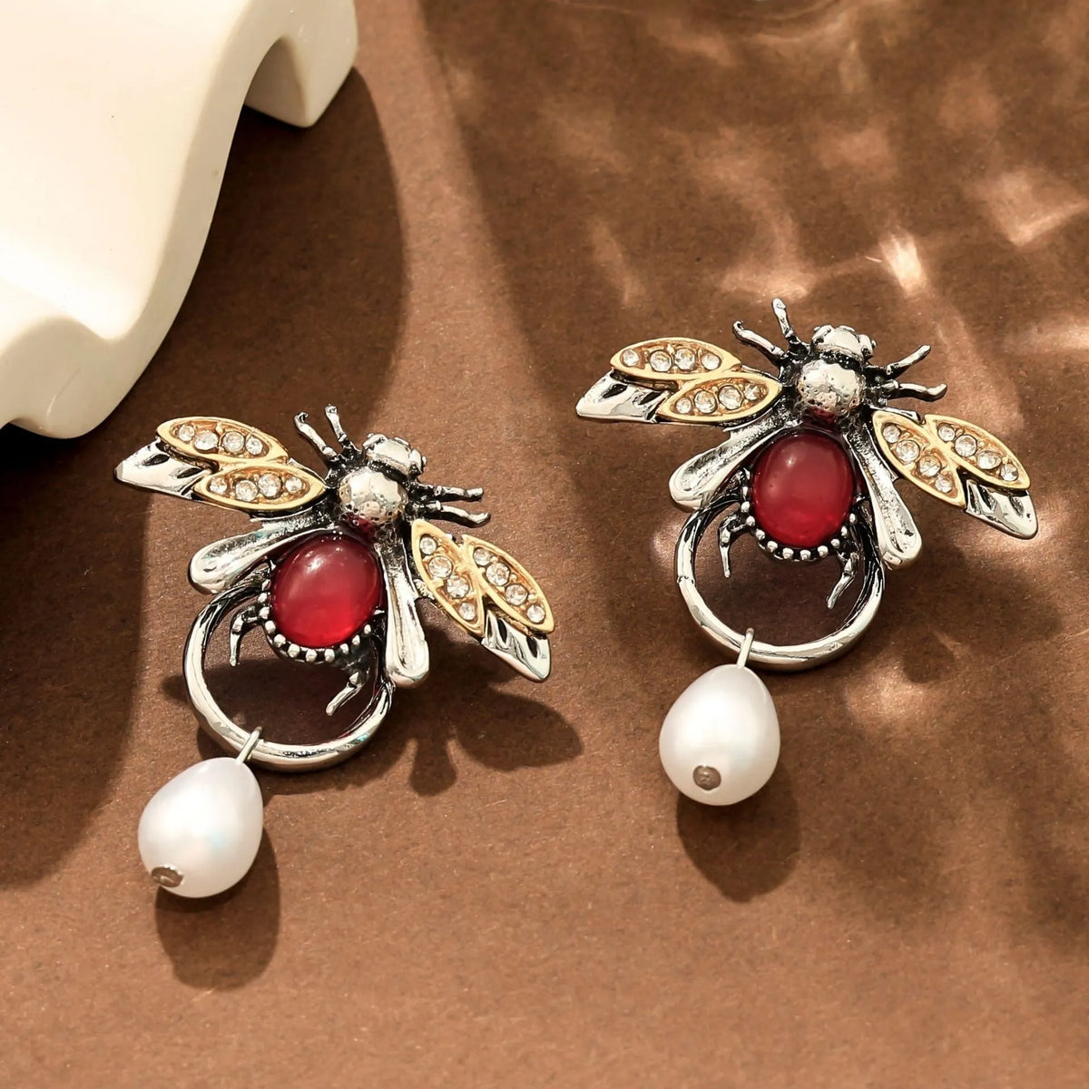 Retro bee drop earrings in alloy with regular chain, shown in gold or antique white K for women