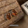 Three pairs of geometric earrings with tassel detailing in different styles: round, irregular, and water drop shapes.