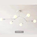Simple black and white Nordic style iron chandelier ceiling lamp with multiple light heads.