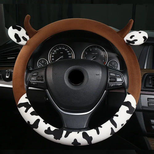 Short plush steering wheel cover in black colour showing comfortable grip surface