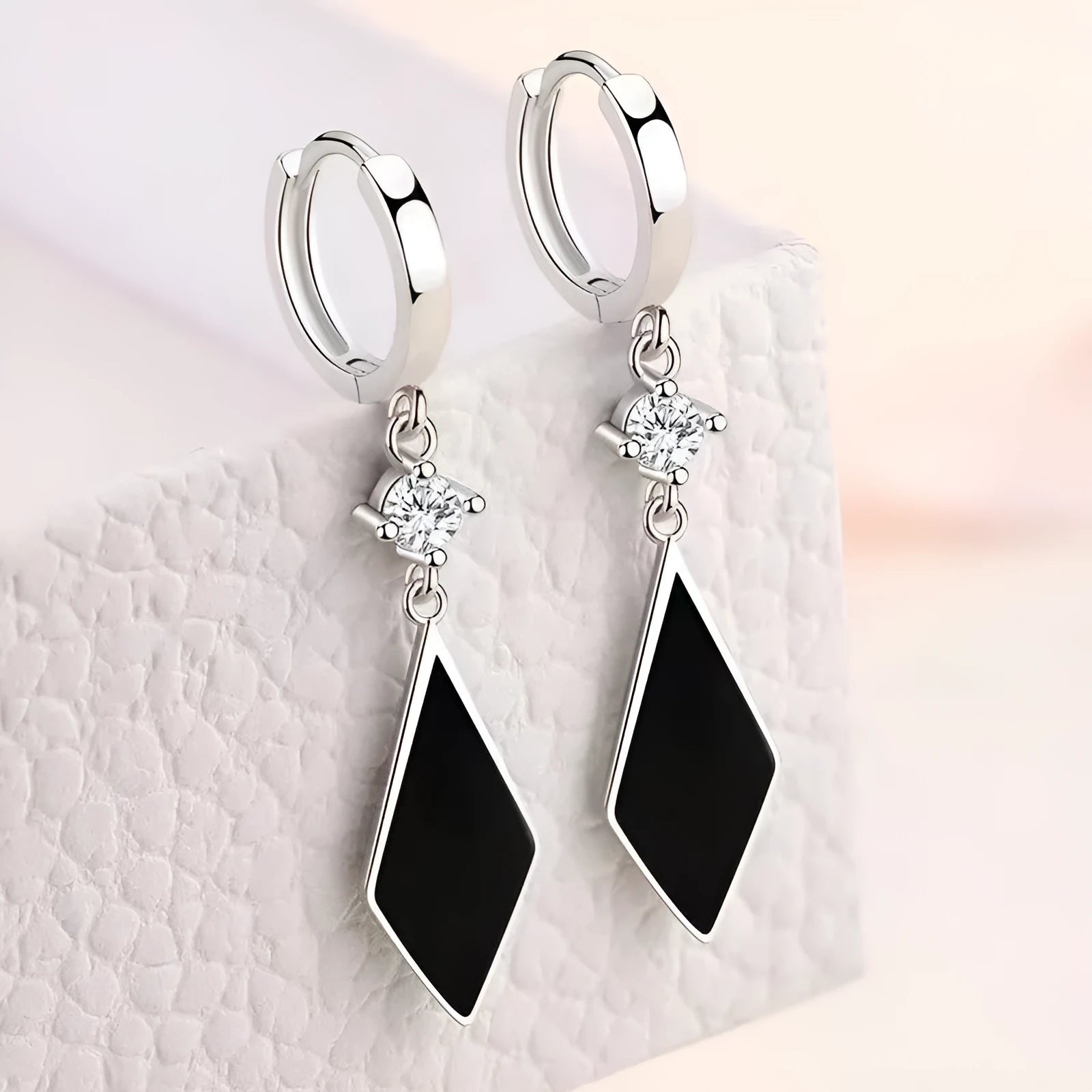 A pair of silver vintage diamond geometric clip-on earrings for women.