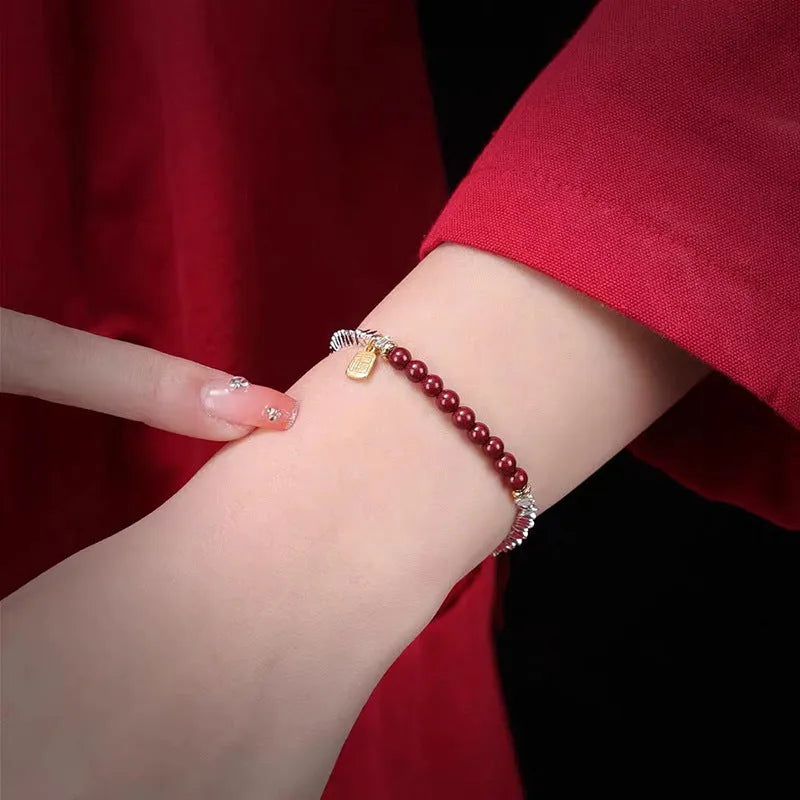 Geometric silver lucky beads couple bracelet on white background.