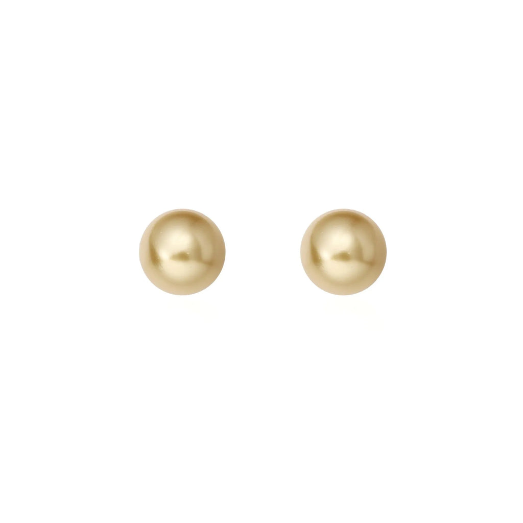 Geometric large pearl stud earrings with an eight-point star detail on a silver setting.