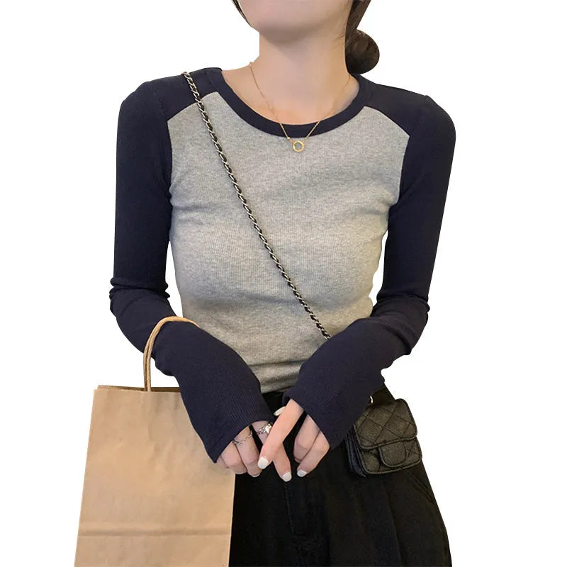 Women's dark blue oversized viscose top with embroidery on the front and princess sleeves.