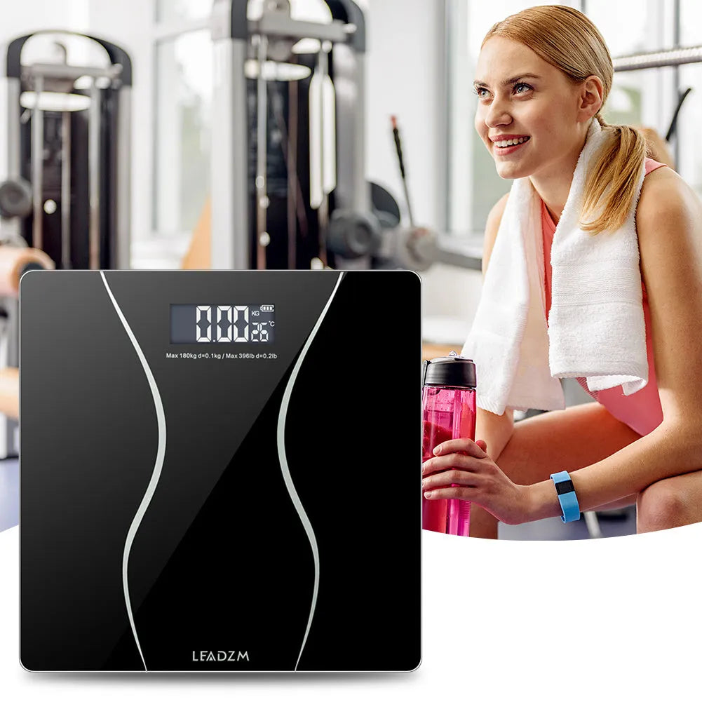 Black electronic bathroom scales with digital display for weight measurement up to 180kg