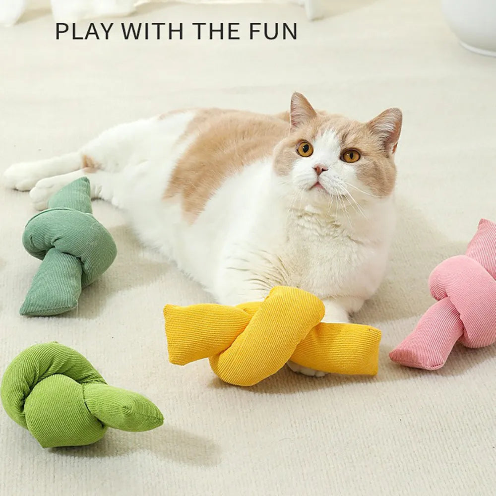 White knotted cotton rope dog toy for chewing and tug of war.