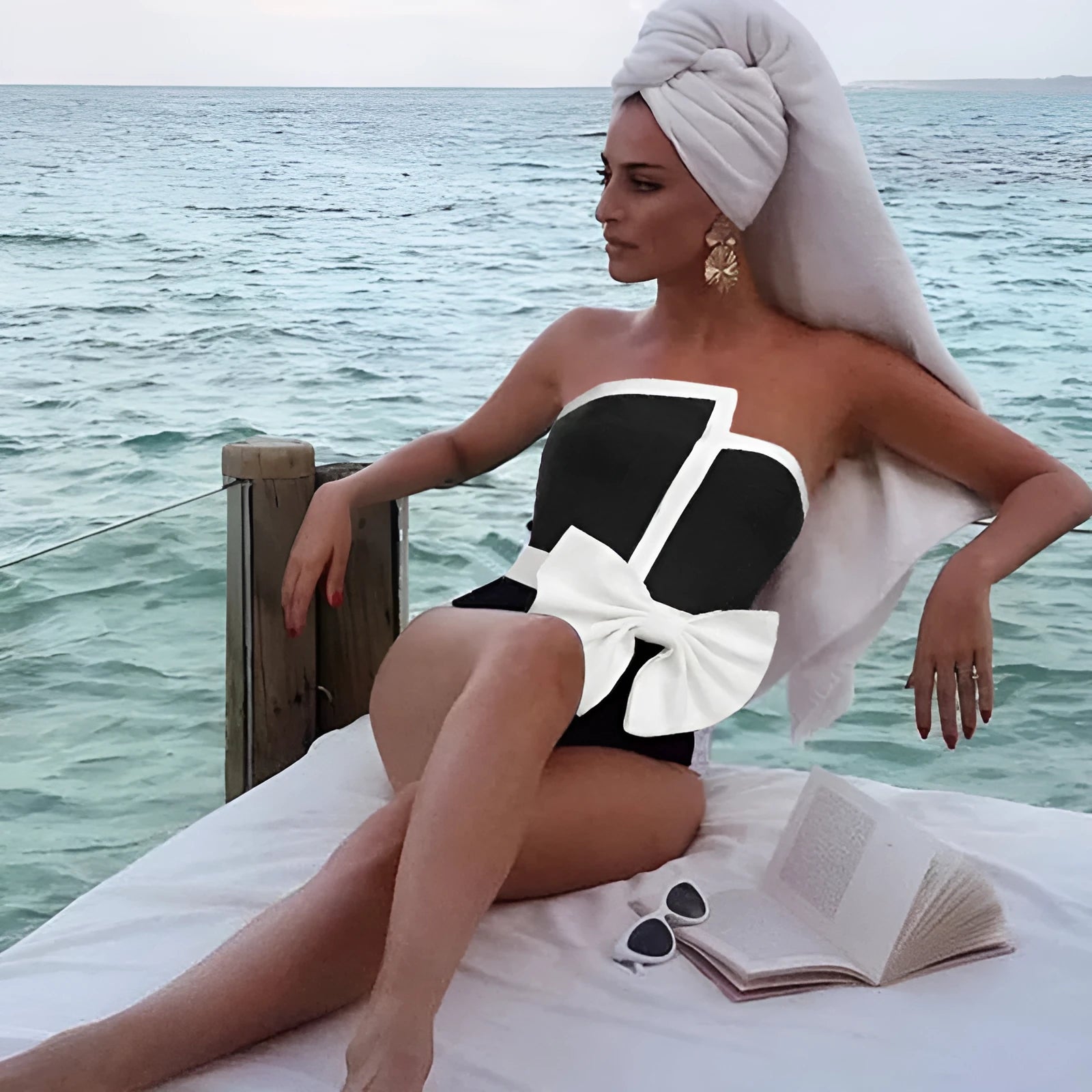 Black and white colour-blocking women's swimsuit with bow detail and irregular tube top