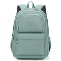 Women's waterproof nylon travel backpack with multi-compartments in rose red colour showing organisational features