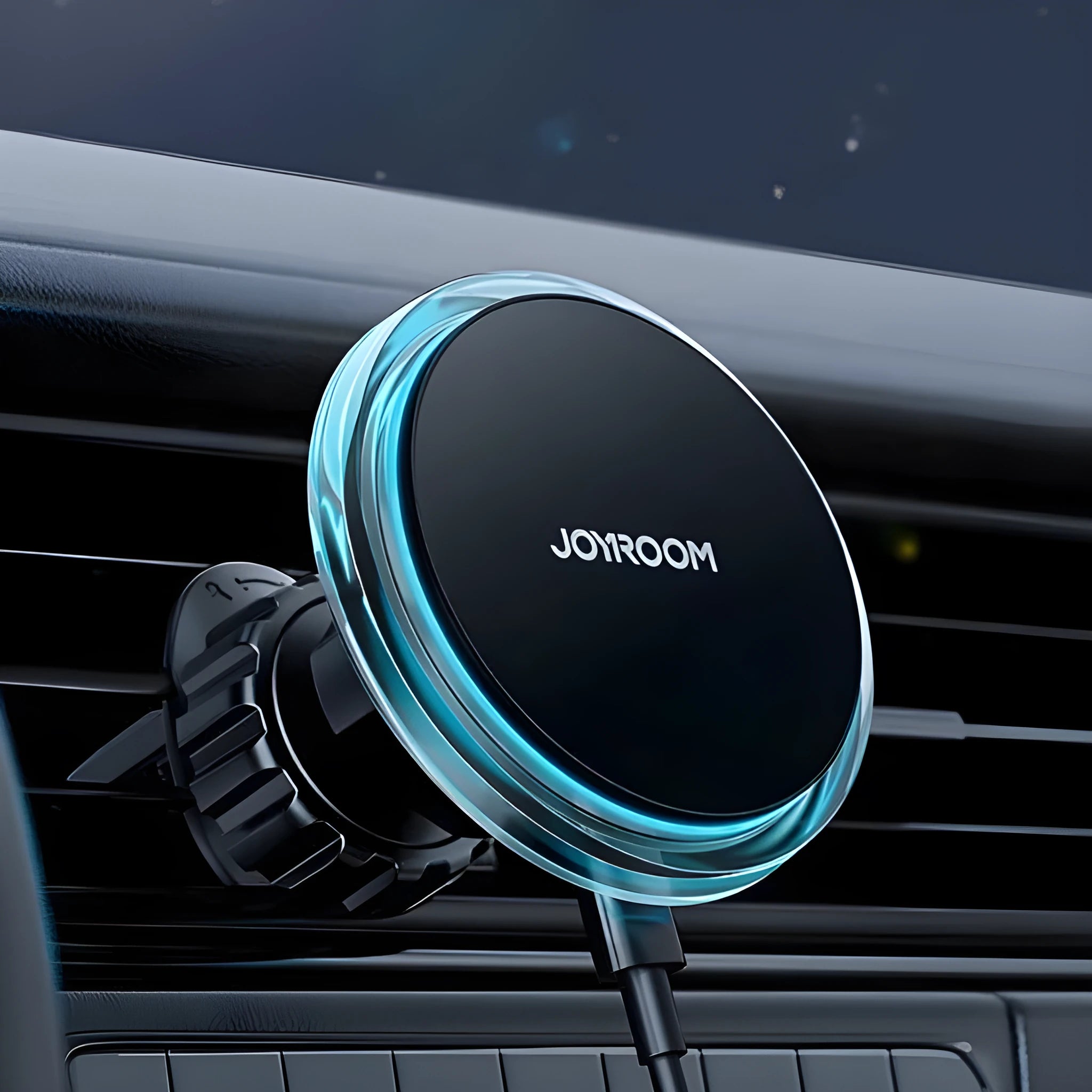 Black magnetic wireless charging car phone mount attached to vehicle air vent