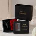 Red Korean-style gift box open to show six pink soap flowers, with a matching red handbag beside it.