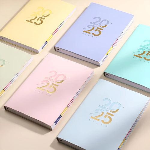A5 2025 daily planner notebook with soft faux leather cover in multiple colours, open to show lined pages.