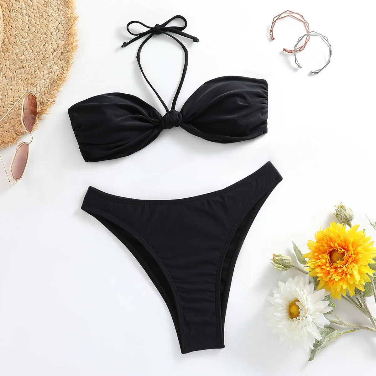 Black women's bikini set with lace-up front tube top and briefs.