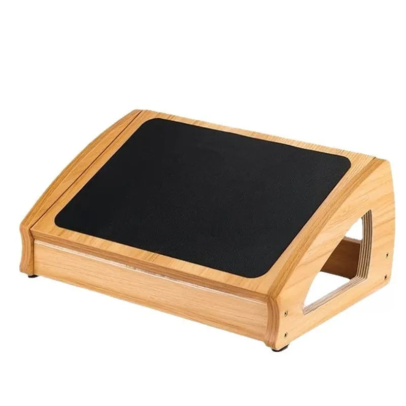 Wooden adjustable bamboo office desk footstool in natural wood colour.