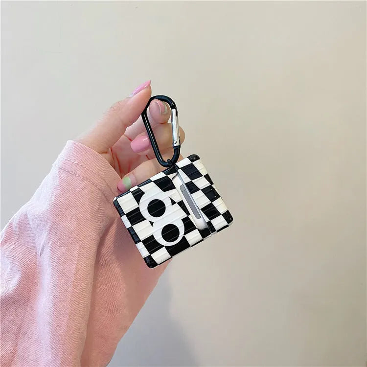 Black and white checkerboard pattern AirPods protective cover with large eye design for Apple AirPods models