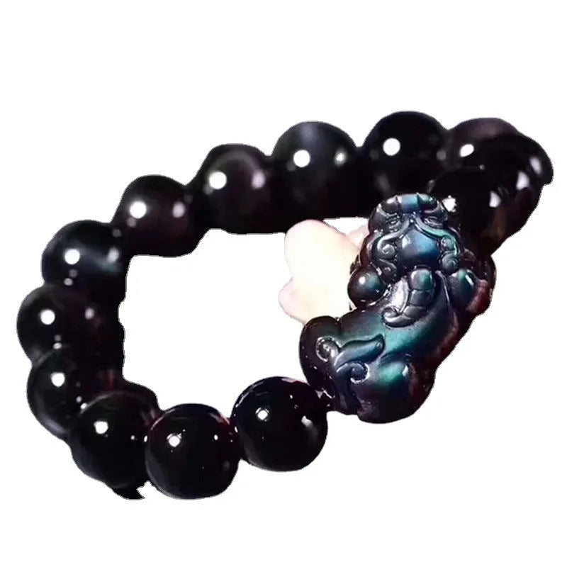 Natural ice colour obsidian crystal bracelet showing different bead size options on a wrist.