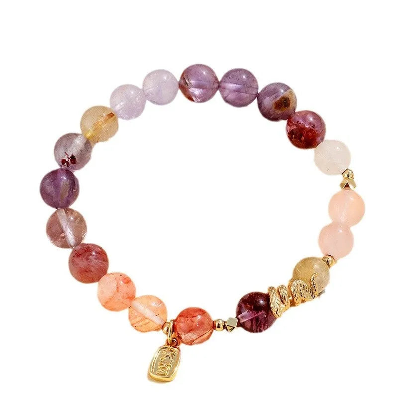 Women's crystal bead bracelet with lucky snake charms and colourful plastic flower accents