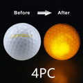 White LED golf ball on grass with 42.6mm diameter for night training, hard resin surface