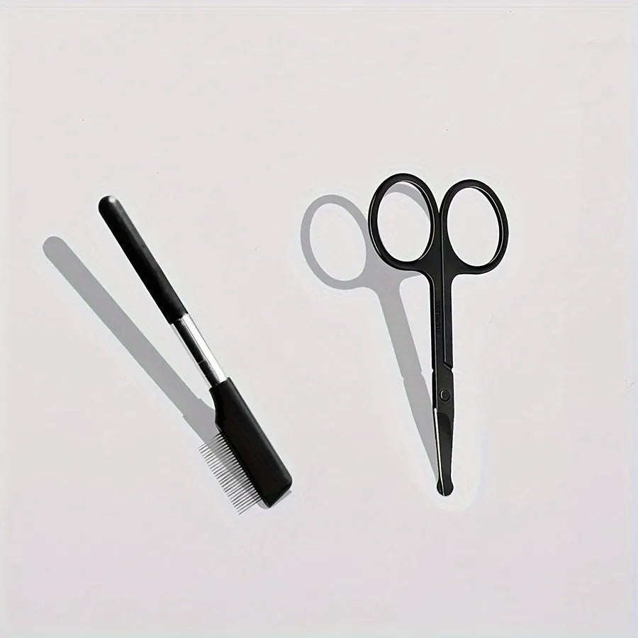 Black pet grooming brush with soft bristles for tear stain removal and comb attachment for dogs and cats