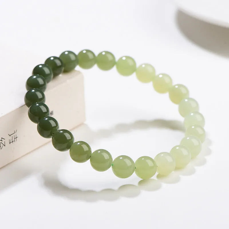 Natural clear water Hetian jade bracelet with gradient colour round or barrel beads