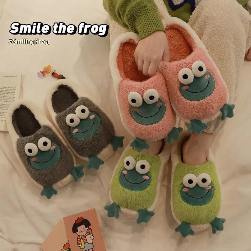 Green winter cotton slippers with coral fleece lining and cartoon frog pattern on a flat sole