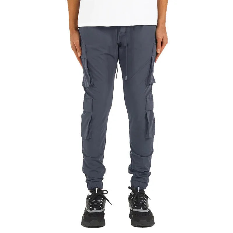Men's stretch breathable nylon ankle banded sports slacks in black, for fitness and leisure
