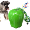 Green plastic apple-shaped dog toy with a molar design and a food dropping ball function.
