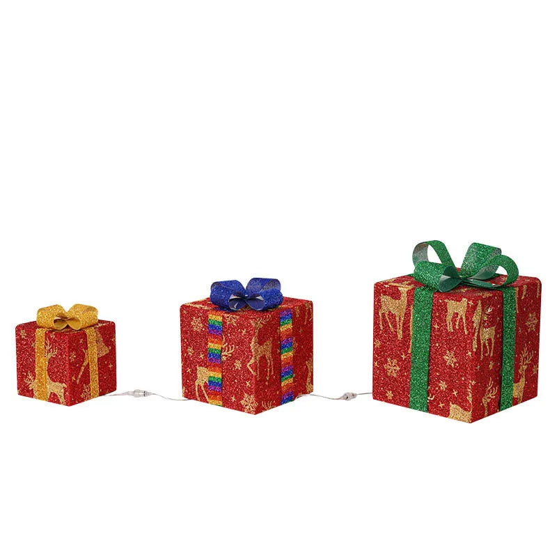 Set of three pre-lit Christmas gift box decorations with fabric bows and LED lights