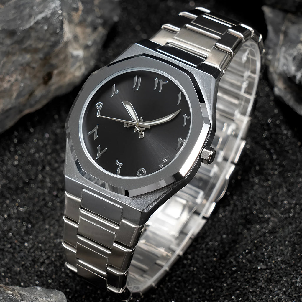 Business casual men's quartz watch with a steel belt on a wrist, showing dial colour options of black, black with silver scale, or silver with black accents.