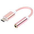 Nylon-woven Type-C to 3.5mm female headphone adapter cable in black, shown next to a smartphone.