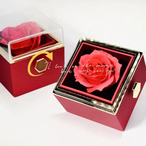 Rotating drawer jewellery gift box with preserved red rose under clear acrylic dome.