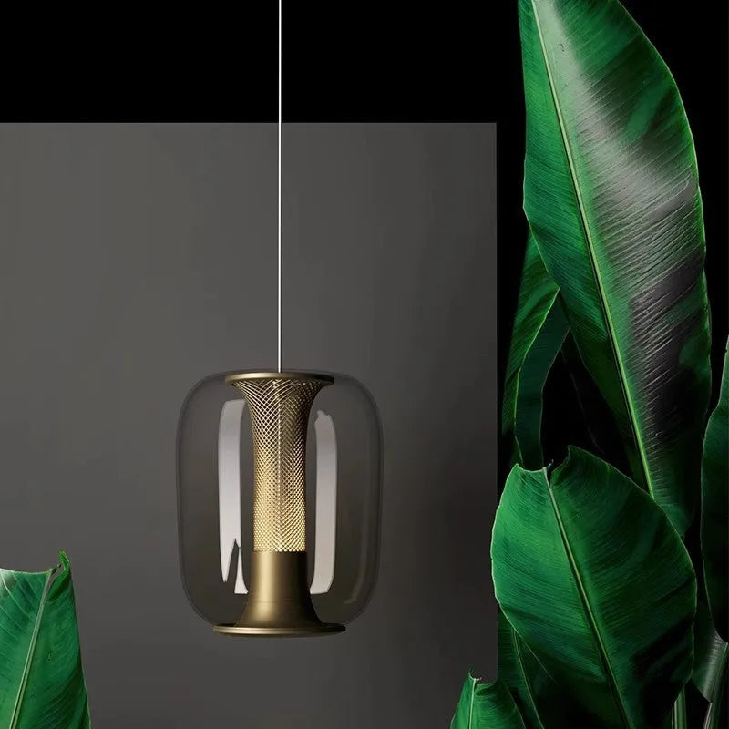 Minimalist Nordic pendant light with a spherical glass globe shade in smoky grey colour.