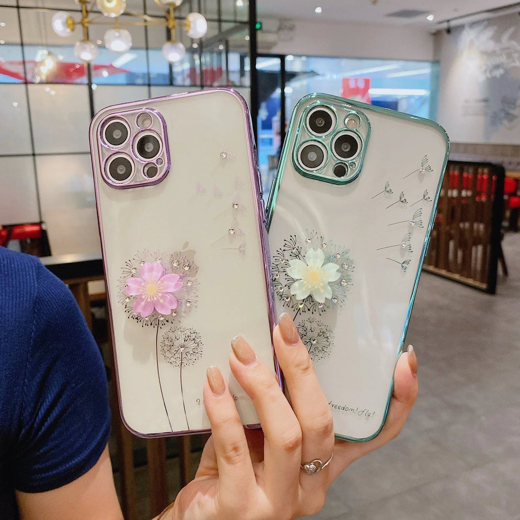 Green iPhone case with 3D floral design and a rotating kickstand extended from the back.