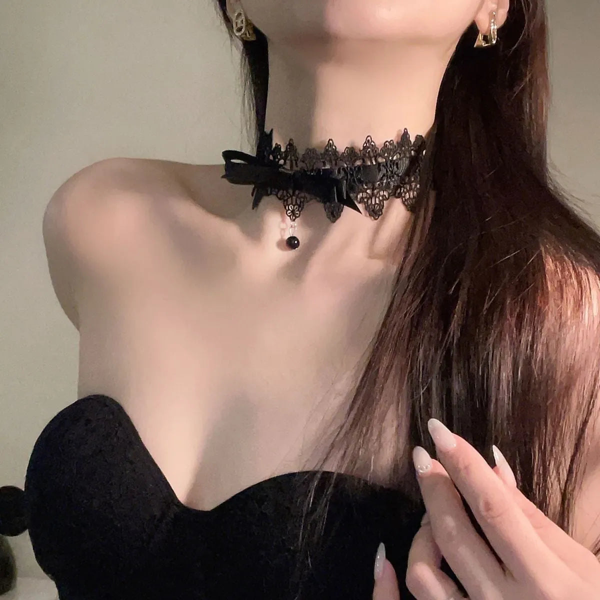 Lolita gothic bow lace choker necklace with fabric pendant and alloy chain on display