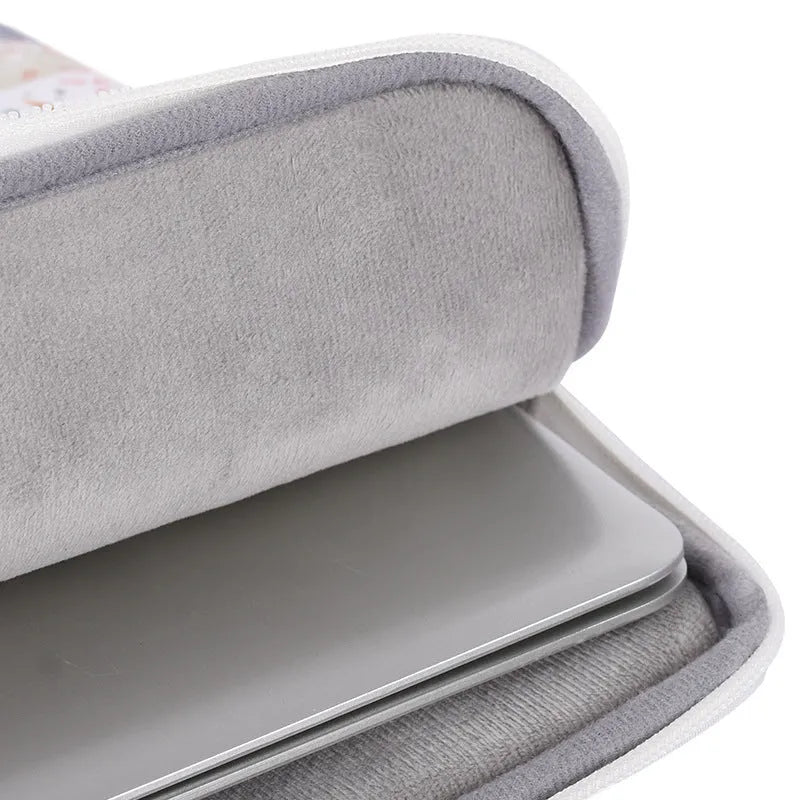 White waterproof PU leather laptop inner bag for 11 to 15 inch computers.
