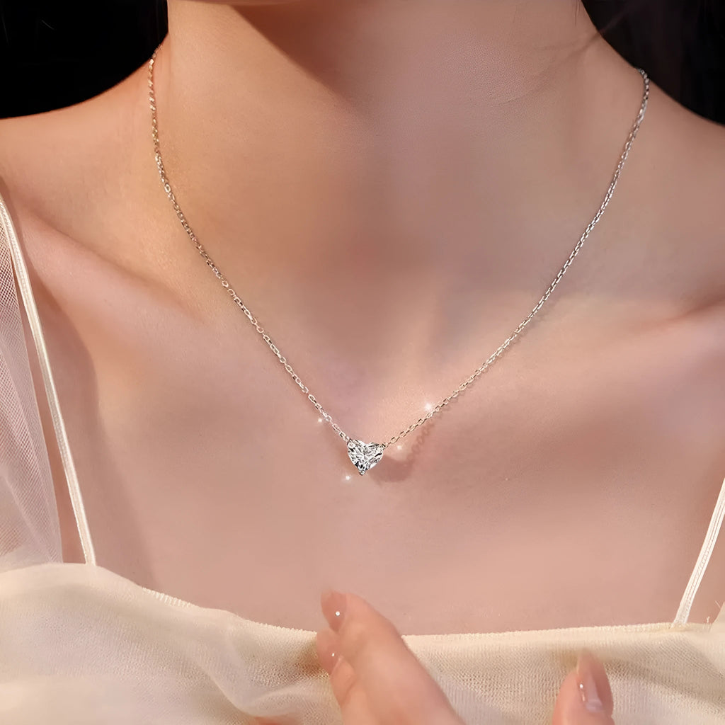 Silver-colour heart necklace with copper construction and simple pendant design