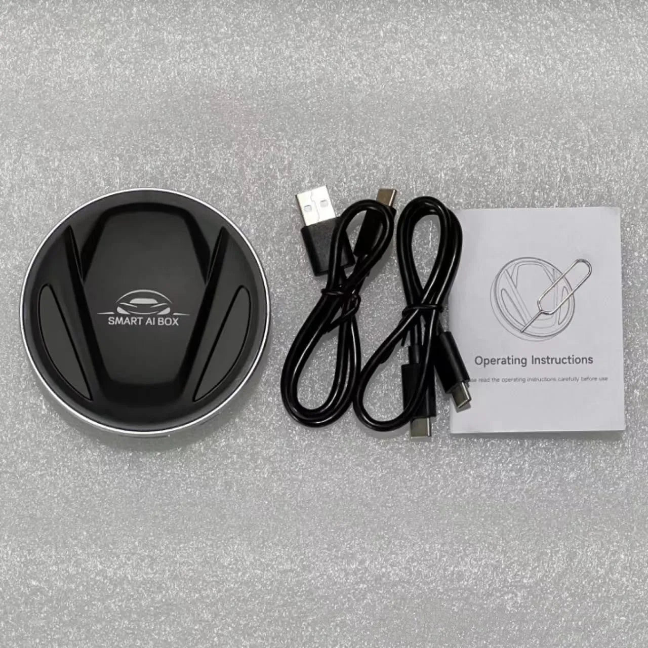 Black plastic CarPlay box TBOX measuring 79x79x18mm with USB cable and accessories