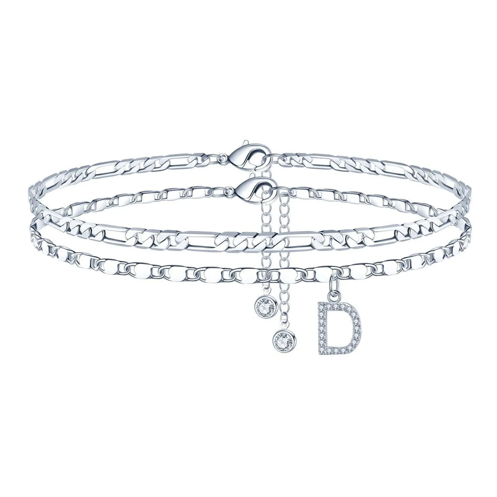 Silver-coloured double-circle bead copper anklet showing alphabet letter modelling on ankle.