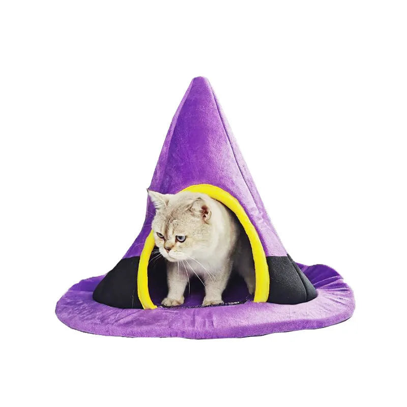 Purple cloth witch hat-shaped cat nest bed for small pets on a white background.