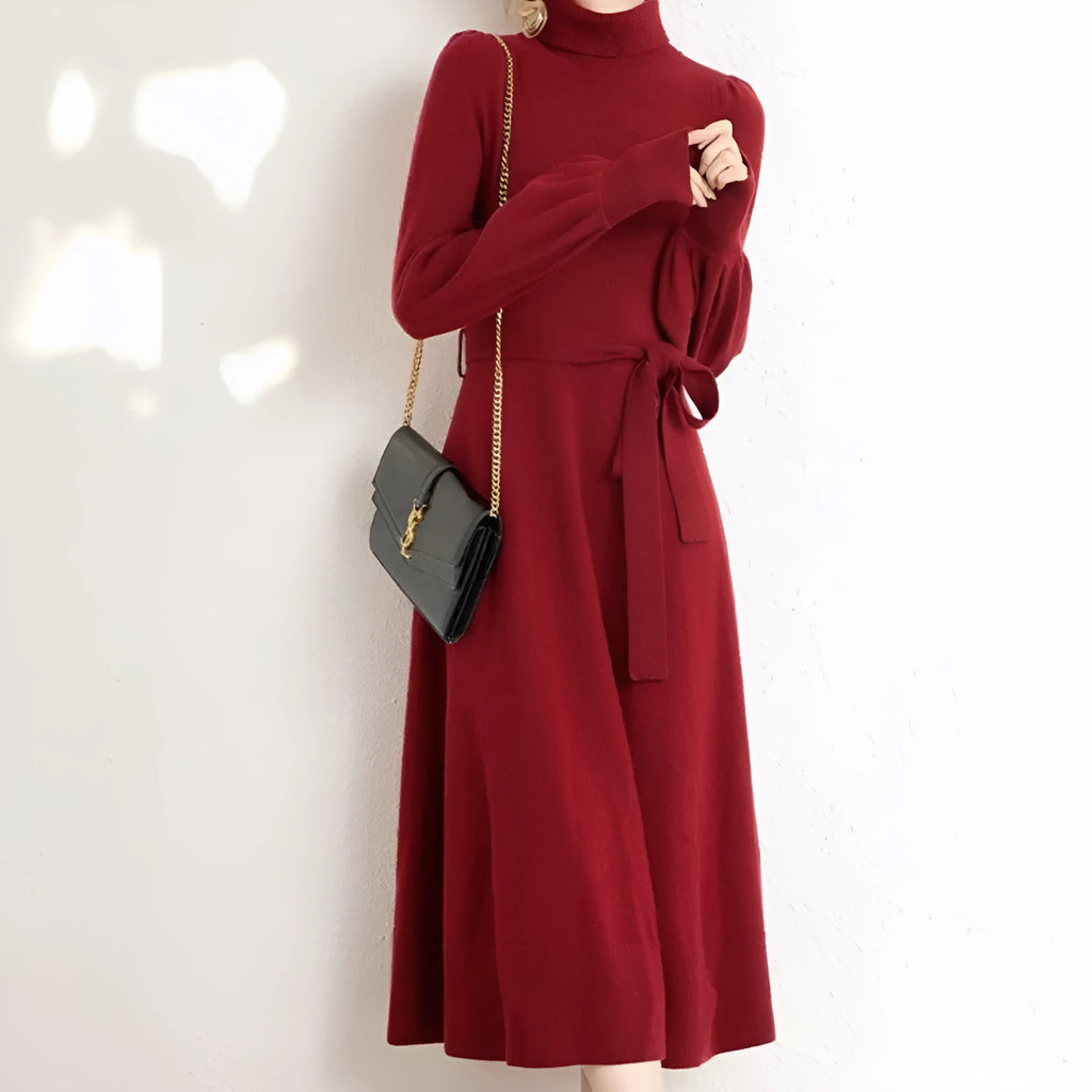 Rose red turtleneck knitted polyester dress with long sleeves, elastic waist, and a loose mid-length skirt hem.