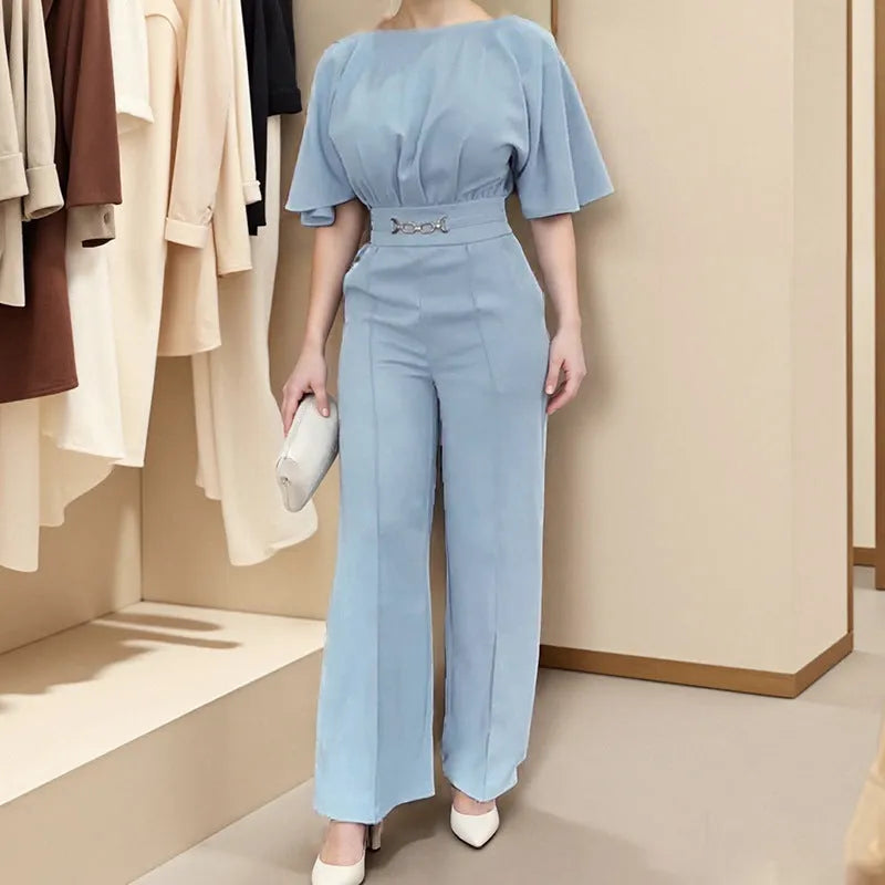 Blue men's two-piece polyester suit set on a hanger, featuring a long-sleeve shirt and trousers.