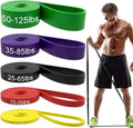 Five TPE resistance bands in yellow, red, black, purple and green for general fitness use