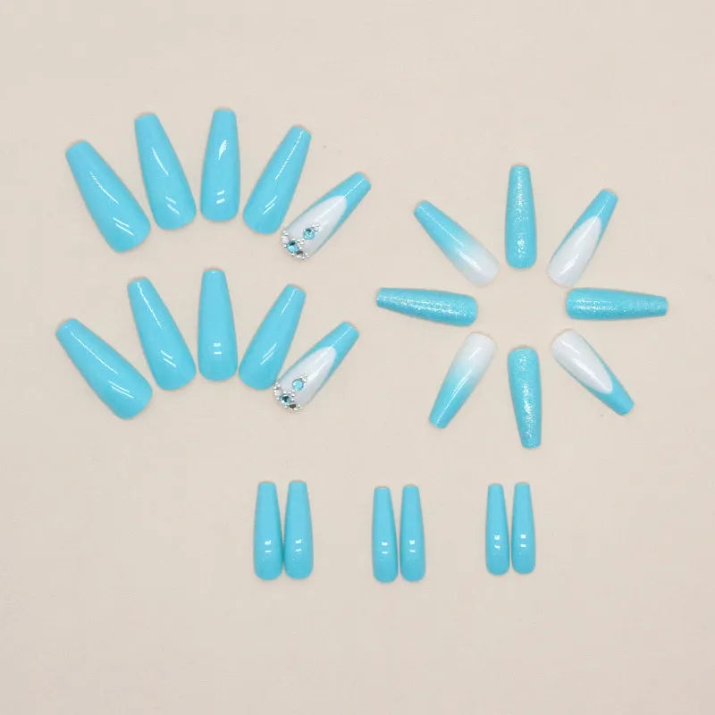 Long ballet shaped artificial nail patches with smart blue diamond pattern on solid blue background