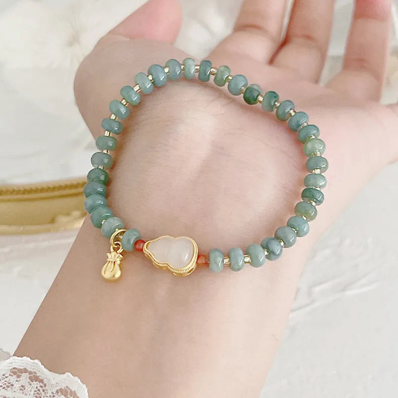 Jade bracelet with gourd pendant and peace buckle charms in natural blue water jade