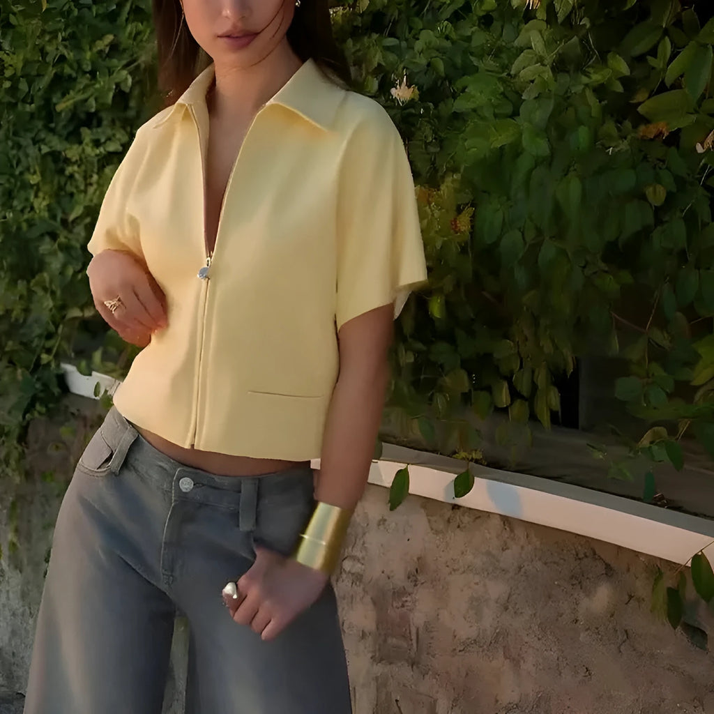 Loose-fit short-sleeve polyester casual top on a hanger in yellow.