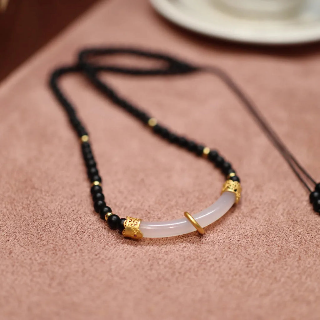 Matte black agate and white chalcedony necklace with 925 silver pendant in Chinese U-shaped design