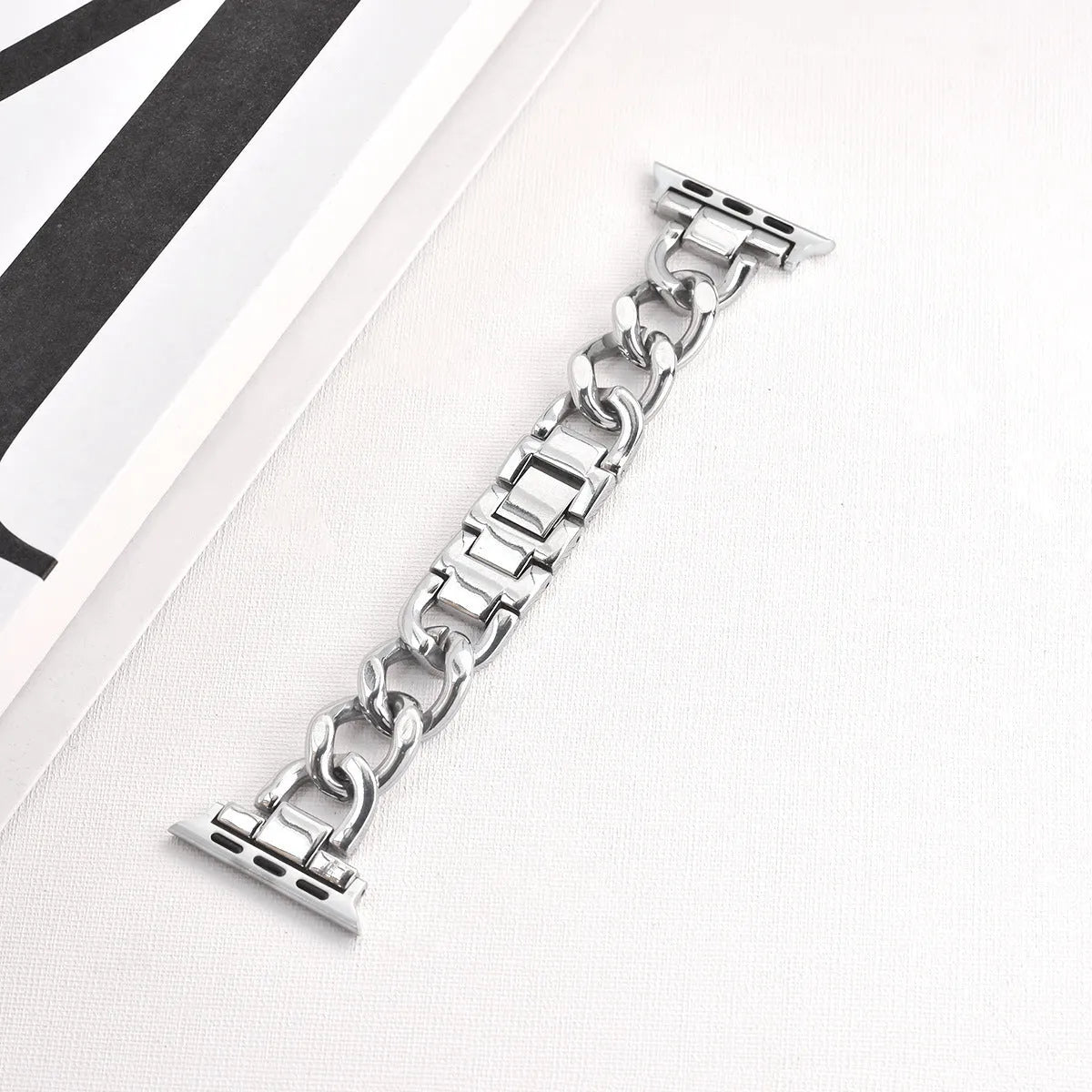 Metal denim chain link Apple Watch strap in silver, black, gold, rose gold and starlight colours.