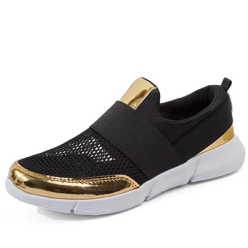 Women's blue breathable low-top sneakers with mesh interior on a hard floor