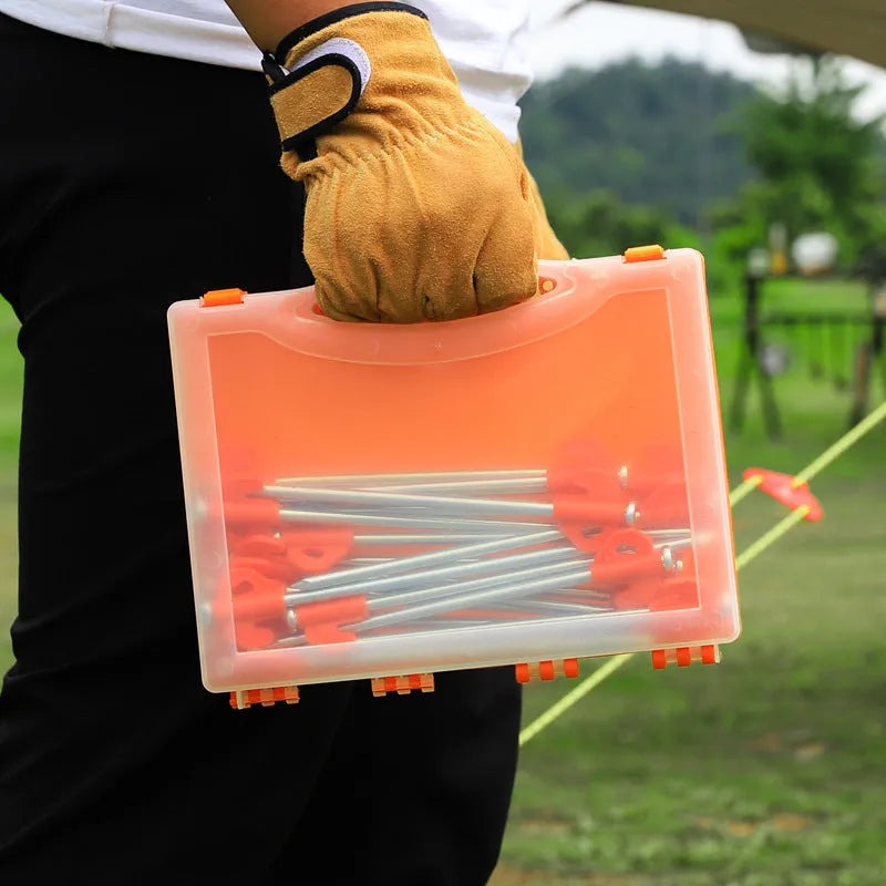Boxed orange plastic tent stake measuring 6.5x20.5mm with flat head