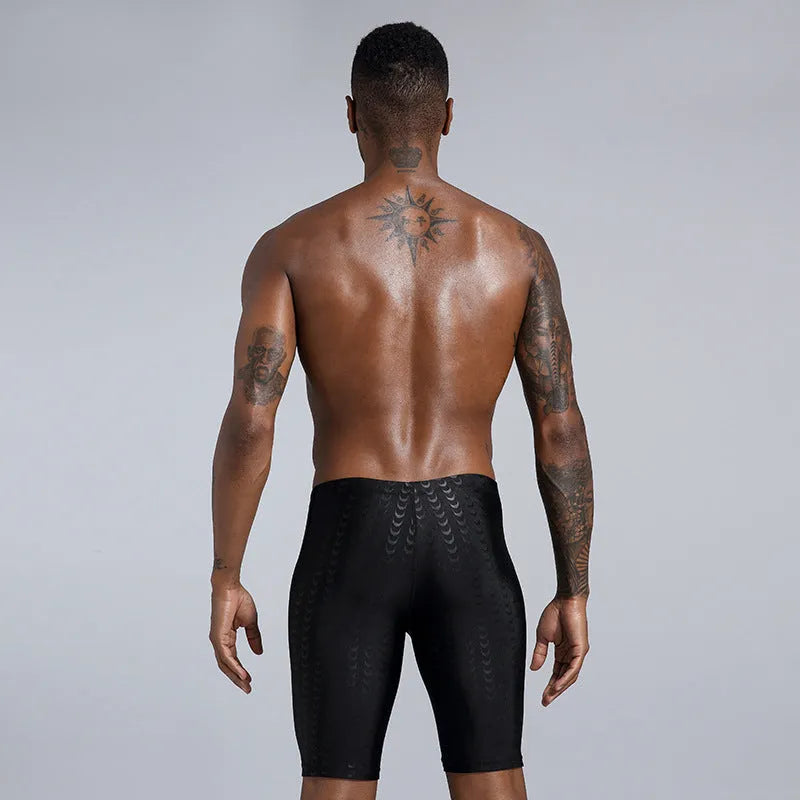 Men's solid colour polyester swimming trunks for swimming and beach activities